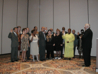 swearing in by AFGE President Bobby Harnage